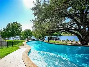 Resort-style pool at luxury waterfront property — Canyon Creek Inspections